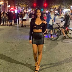 Short black leather skirt